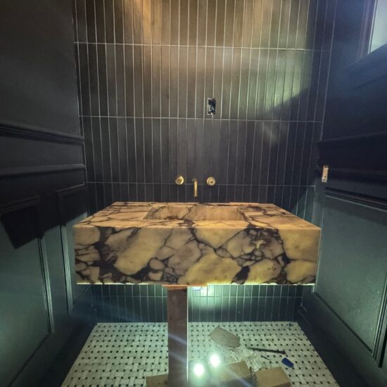 Custom Marble Calacatta Viona integrated sink vanity fabricated and installed in Abbotsford by Meva Granite Ltd. Expert marble, quartz, and granite countertop specialists serving Metro Vancouver.