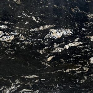 Titanium granite is a bold black natural stone with dramatic white veining, perfect for kitchen countertops, fireplaces, and outdoor kitchens in Vancouver, Burnaby, Surrey, Coquitlam, and Metro Vancouver.