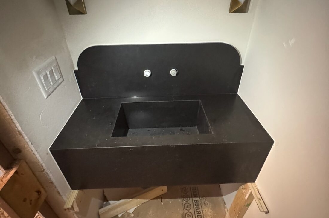Silestone Corktown quartz bar, countertop, and integrated vanity sink installation in West Vancouver and Metro Vancouver including Vancouver, Burnaby, Coquitlam, Surrey, Delta, Maple Ridge, Port Coquitlam, North Vancouver and Downtown Vancouver. Seamless mitered sinks with waterproof fabrication.