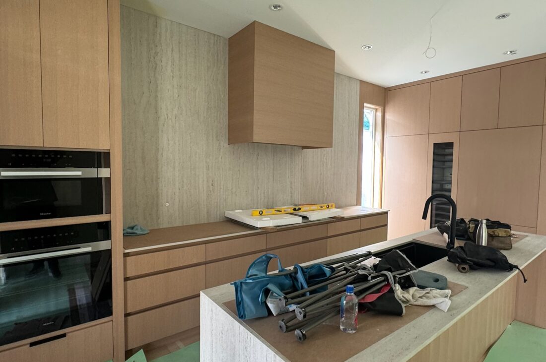 Kitchen quartz countertop and backsplash installation in New Westminster and Metro Vancouver including Vancouver, Burnaby, Coquitlam, Surrey, Delta, Maple Ridge, Port Coquitlam, North Vancouver, West Vancouver and Downtown Vancouver. Dekton Marmorio sintered stone with seamless modern design.
