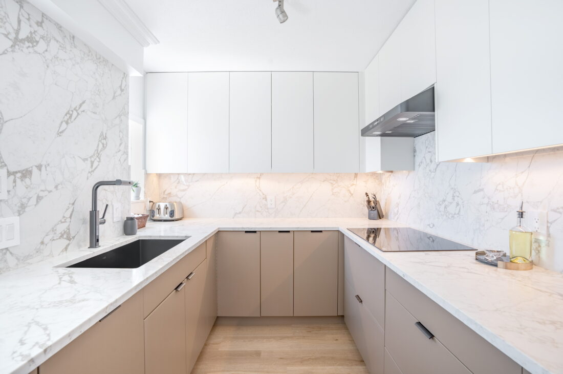 Luxury Vagli Vena 513 quartz kitchen countertops, waterfall island, vanity countertops, and full backsplash installation in Metro Vancouver including Vancouver, Burnaby, Surrey, Coquitlam, Delta, Maple Ridge, North Vancouver, West Vancouver, Port Coquitlam and Downtown Vancouver.