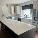 Custom quartz countertops in Maple Ridge featuring Hari Stone Irah 514 Borghini in 3cm thickness. Full kitchen countertops, island, window sill, and custom quartz sink cover professionally fabricated and installed by MeVa Granite.